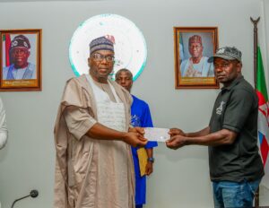 cfafe179-89a9-4654-acb9-841e7ecc128f-300x232 Gov AbdulRazaq Presents ₦80m Cheques to Families of Fallen Forest Guards, Approves ₦100m Support for Edu/Patigi Heroes